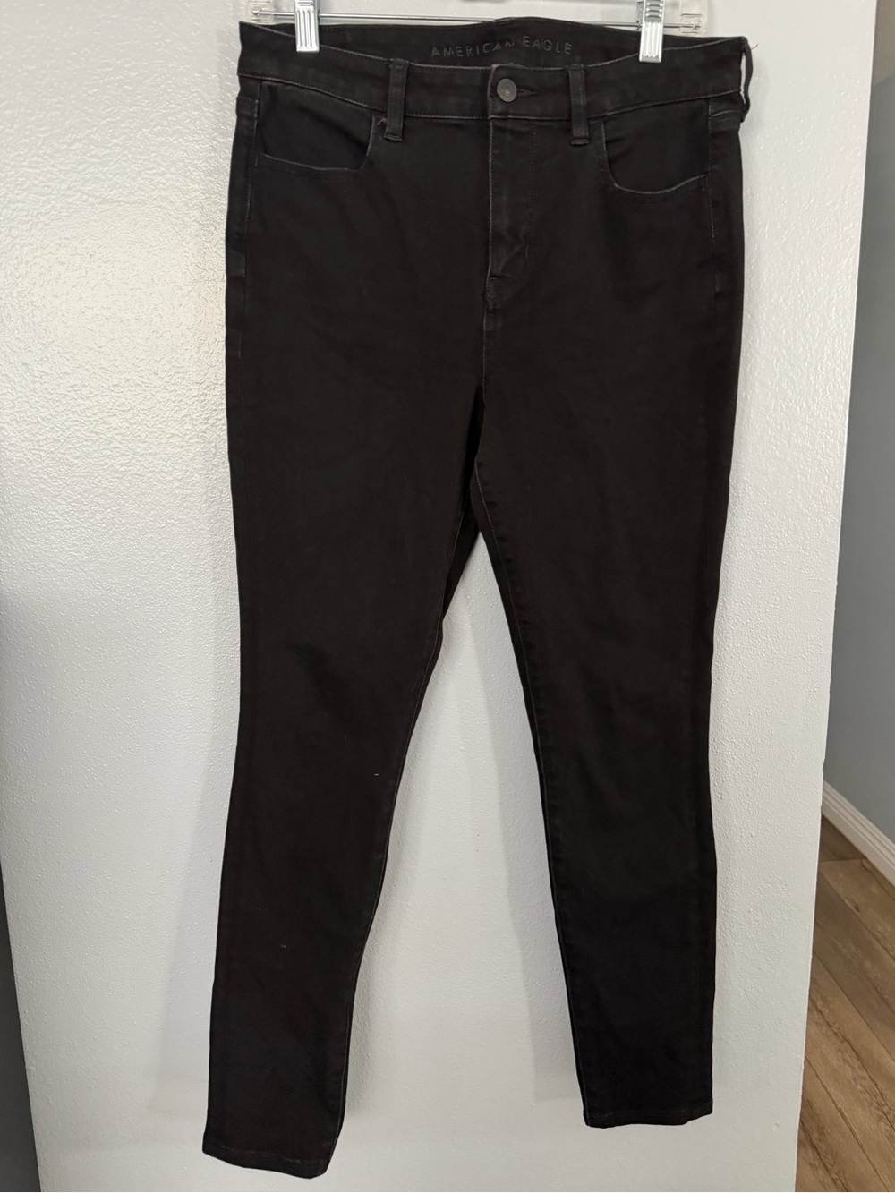 Black American Eagle high-waisted skinny jeans size 10